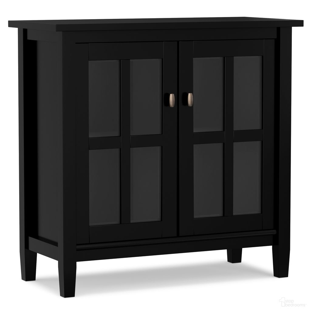 The appearance of Warm Shaker Solid Wood Low Storage Cabinet In Black designed by Simpli Home in the transitional interior design. This black piece of furniture was selected by 1StopBedrooms from Warm Shaker Collection to add a touch of cosiness and style into your home. Sku: AXCWSH14-BL. Material: Pine.