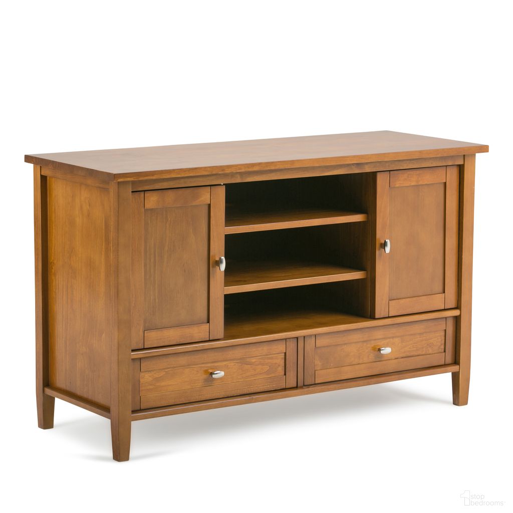 The appearance of Warm Shaker Solid Wood TV Media Stand In Light Golden Brown designed by Simpli Home in the transitional interior design. This light golden brown piece of furniture  was selected by 1StopBedrooms from Warm Shaker Collection to add a touch of cosiness and style into your home. Sku: AXCRWSH16-LGB. Material: Pine.