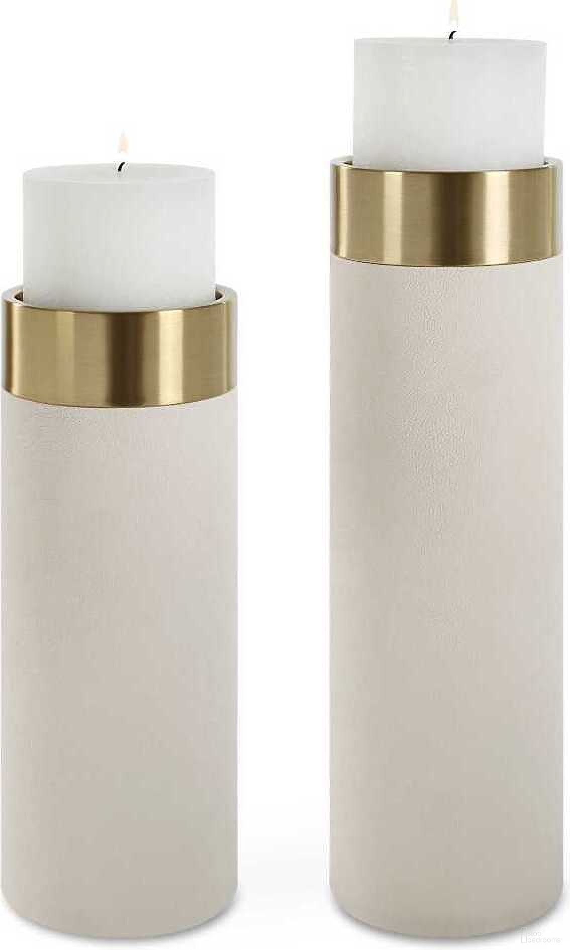 The appearance of Wessex Pillar Candleholders Set of 2 In White and Brushed Brass designed by Uttermost in the modern / contemporary interior design. This white and brushed brass piece of furniture  was selected by 1StopBedrooms from Wessex Collection to add a touch of cosiness and style into your home. Sku: 18100. Material: Iron.