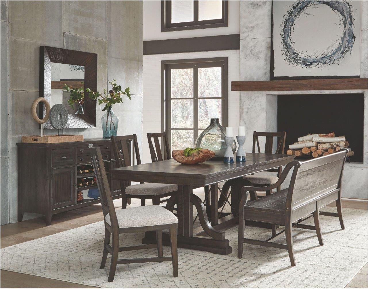 The appearance of Westley Falls Graphite Trestle Extendable Dining Room Set designed by Magnussen in the transitional interior design. This brown piece of furniture was selected by 1StopBedrooms from Westley Falls Collection to add a touch of cosiness and style into your home. Sku: D4399-25B;D4399-25T;D4399-62. Table Base Style: Trestle. Table Top Shape: Rectangular. Size: 38" x 72". Material: Pine Veneer.