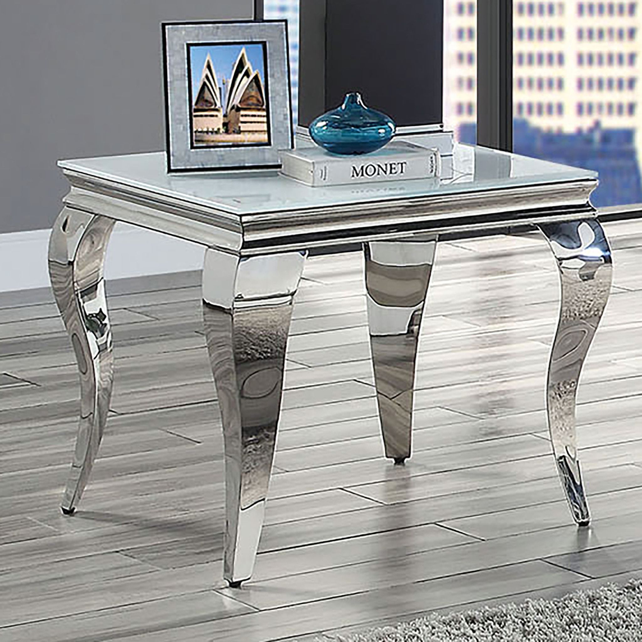 The appearance of Wetzikon End Table In White and Silver designed by Furniture of America in the glam interior design. This white/silver piece of furniture  was selected by 1StopBedrooms from Wetzikon Collection to add a touch of cosiness and style into your home. Sku: CM4903WH-E-1;CM4903E-2;CM4903E-3. Material: Metal.