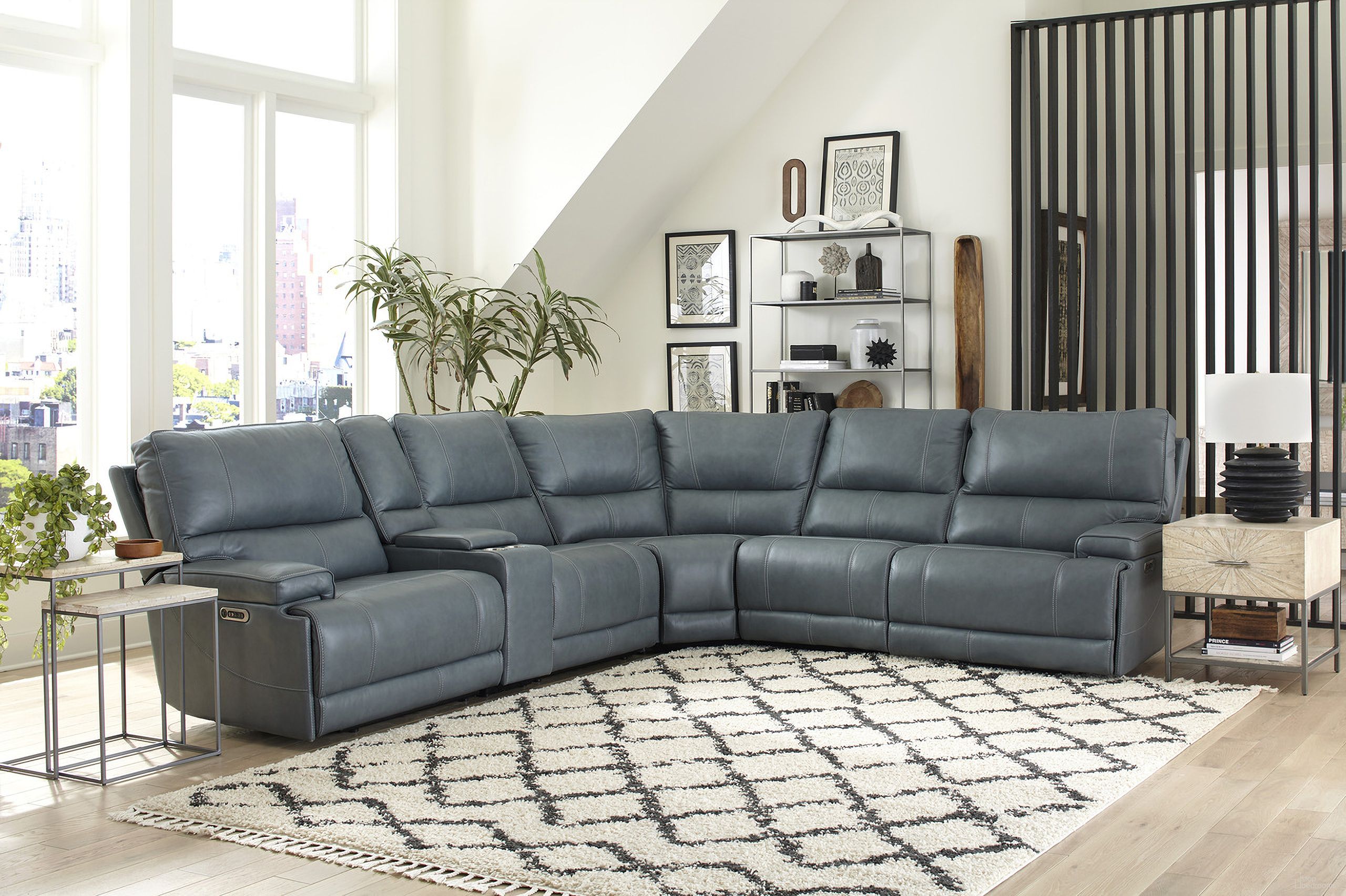 The appearance of Whitman Verona Powered By Freemotion 6 Piece Modular Power Reclining Sectional With Power Headrests And Console In Azure designed by Parker House in the transitional interior design. This azure piece of furniture was selected by 1StopBedrooms from Whitman Collection to add a touch of cosiness and style into your home. Sku: MWHI#810P-P50-VAZ;MWHI#811LPH-P50-VAZ;MWHI#811RPH-P50-VAZ;MWHI#840-P50-VAZ;MWHI#850-P50-VAZ;MWHI#860-P50-VAZ. Material: Top Grain Leather. Layout: L-Shape.