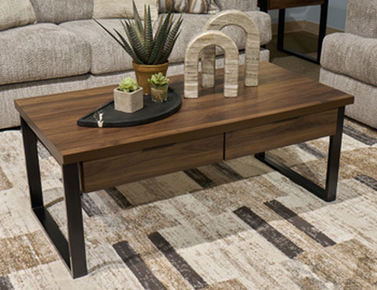 The appearance of Wickman Falls Coffee Table In Dark Brown designed by Signature Design by Ashley in the modern / contemporary interior design. This dark brown piece of furniture was selected by 1StopBedrooms from Wickman Falls Collection to add a touch of cosiness and style into your home. Sku: T318-1. Material: Wood.