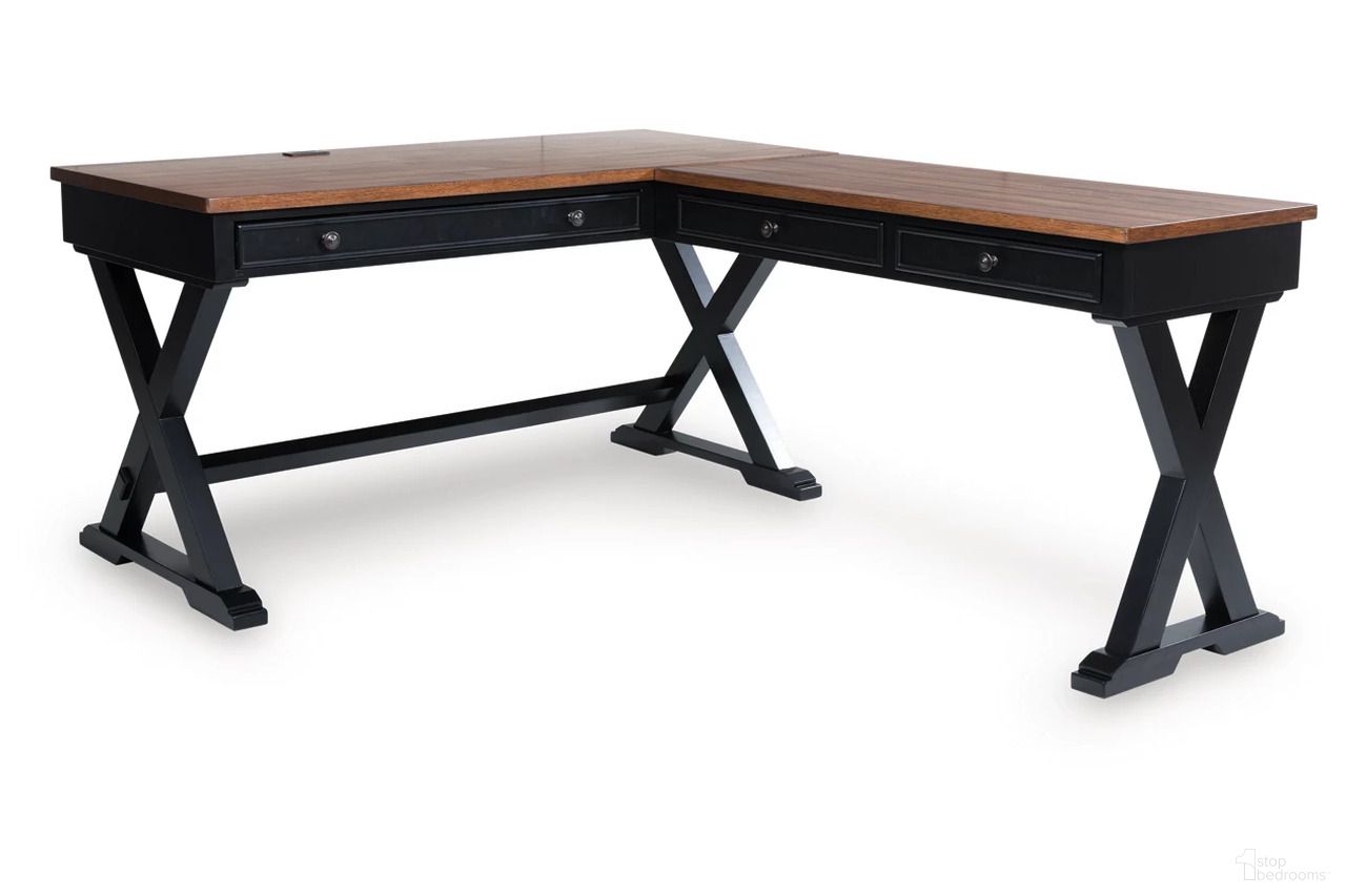 The appearance of Wildenauer Home Office Desk In Brown and Black designed by Signature Design by Ashley in the transitional interior design. This brown/black piece of furniture  was selected by 1StopBedrooms from Wildenauer Collection to add a touch of cosiness and style into your home. Sku: H664-34;H664-34R. Material: Hardwood.