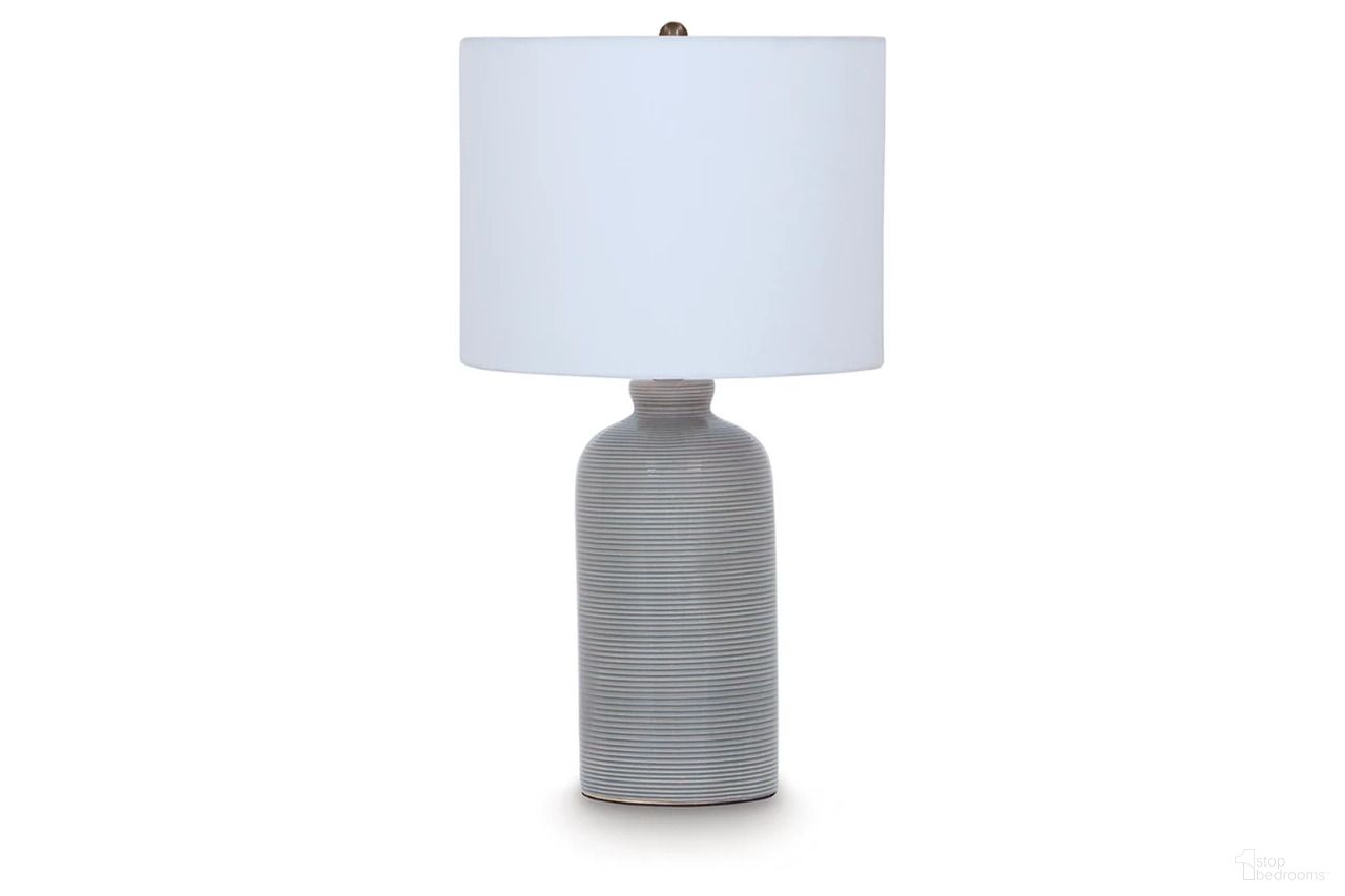The appearance of Wimlow Ceramic Table Lamp In Gray Blue designed by Signature Design by Ashley in the transitional interior design. This gray blue piece of furniture was selected by 1StopBedrooms from Wimlow Collection to add a touch of cosiness and style into your home. Sku: L100924. Material: Ceramic.