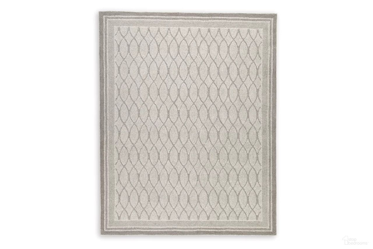 The appearance of Wimney Large Rug In Gray designed by Signature Design by Ashley in the traditional interior design. This gray piece of furniture  was selected by 1StopBedrooms from Wimney Collection to add a touch of cosiness and style into your home. Sku: R407281. Material: Fabric.