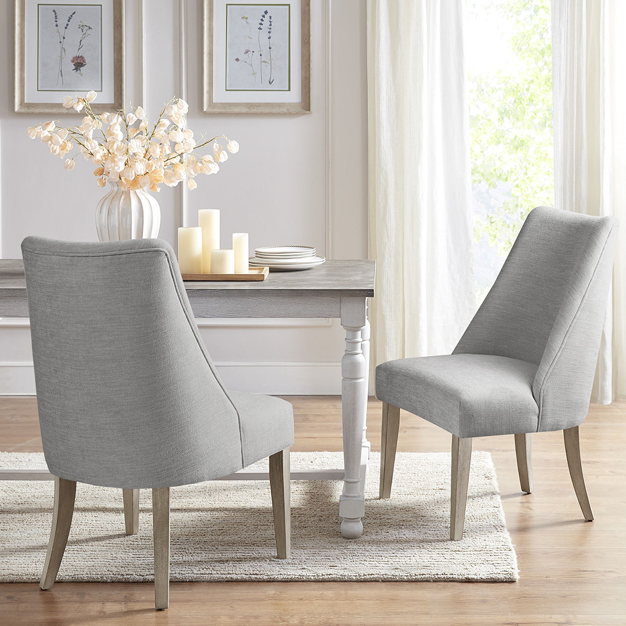 The appearance of Winfield Upholstered Dining Chair Set of 2 In Light Grey designed by Martha Stewart in the country / farmhouse interior design. This light grey piece of furniture was selected by 1StopBedrooms from Winfield Collection to add a touch of cosiness and style into your home. Sku: MT108-0160. Material: Wood. Chair Type: Side Chair.