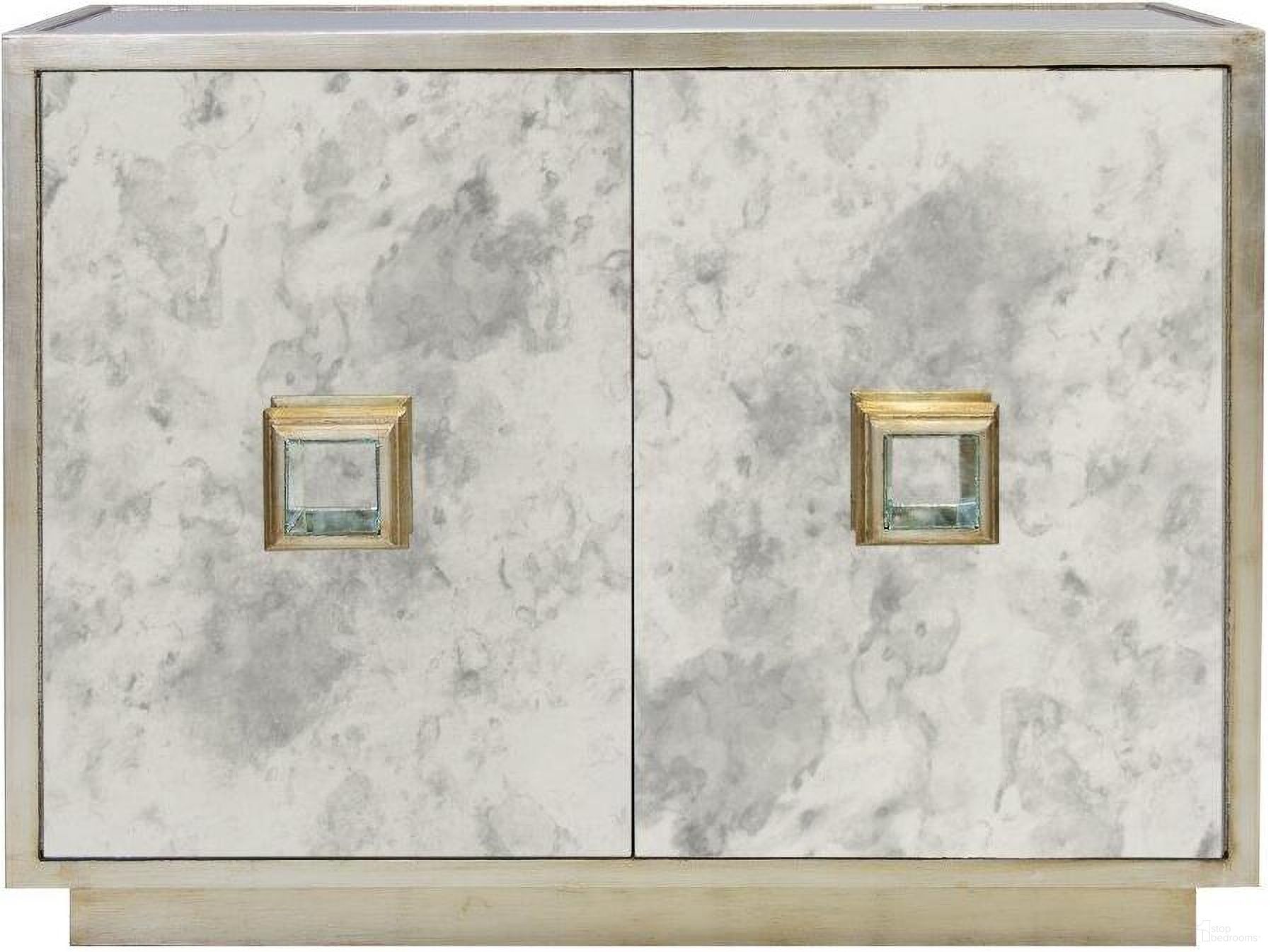 The appearance of Winslow Antique Mirror And Champange Silver Leaf 2 Door Cabinet designed by Worlds Away in the modern / contemporary interior design. This silver piece of furniture was selected by 1StopBedrooms from Winslow Collection to add a touch of cosiness and style into your home. Sku: WINSLOW AMS. Material: Metal.