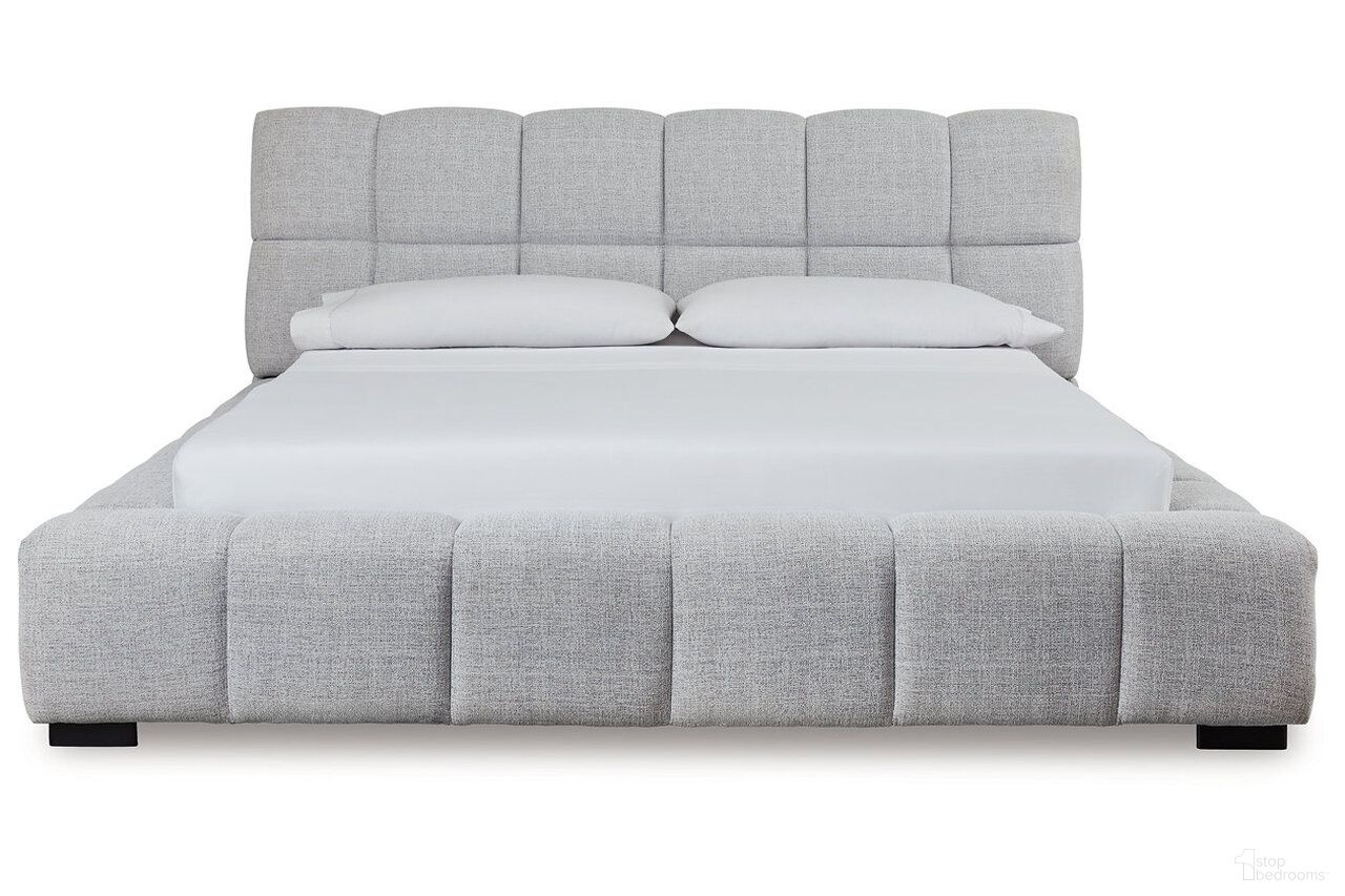 The appearance of Wisperport California King Upholstered Bed In Light Gray designed by Signature Design by Ashley in the modern / contemporary interior design. This light gray piece of furniture  was selected by 1StopBedrooms from Wisperport Collection to add a touch of cosiness and style into your home. Sku: NCB584-82;NCB584-94. Material: Fabric. Bed Size: California King. Bed Type: Upholstered Bed.