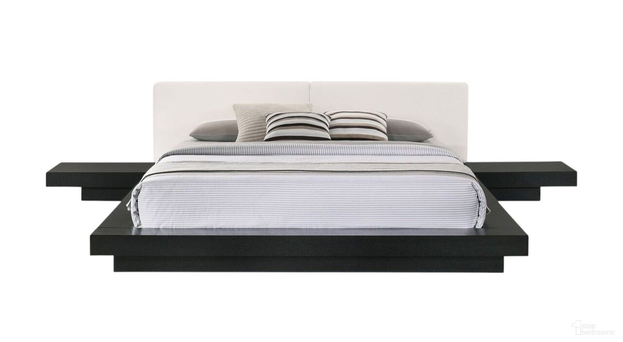 The appearance of Wood and Faux Leather King Bed Frame with Attached Nightstands In Black and White designed by Homeroots in the modern / contemporary interior design. This black and white piece of furniture  was selected by 1StopBedrooms from  to add a touch of cosiness and style into your home. Sku: 486265. Material: Faux Leather. Bed Size: King.