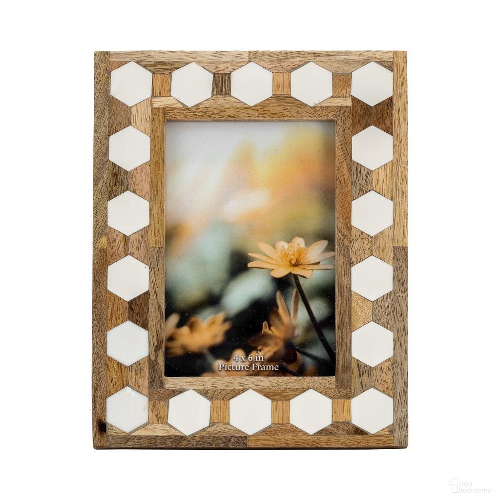 The appearance of Wood And Resin 4 x 6 Hexagon Frame In White designed by Sagebrook Home in the modern / contemporary interior design. This white piece of furniture was selected by 1StopBedrooms from to add a touch of cosiness and style into your home. Sku: 17915-01. Material: Resin.