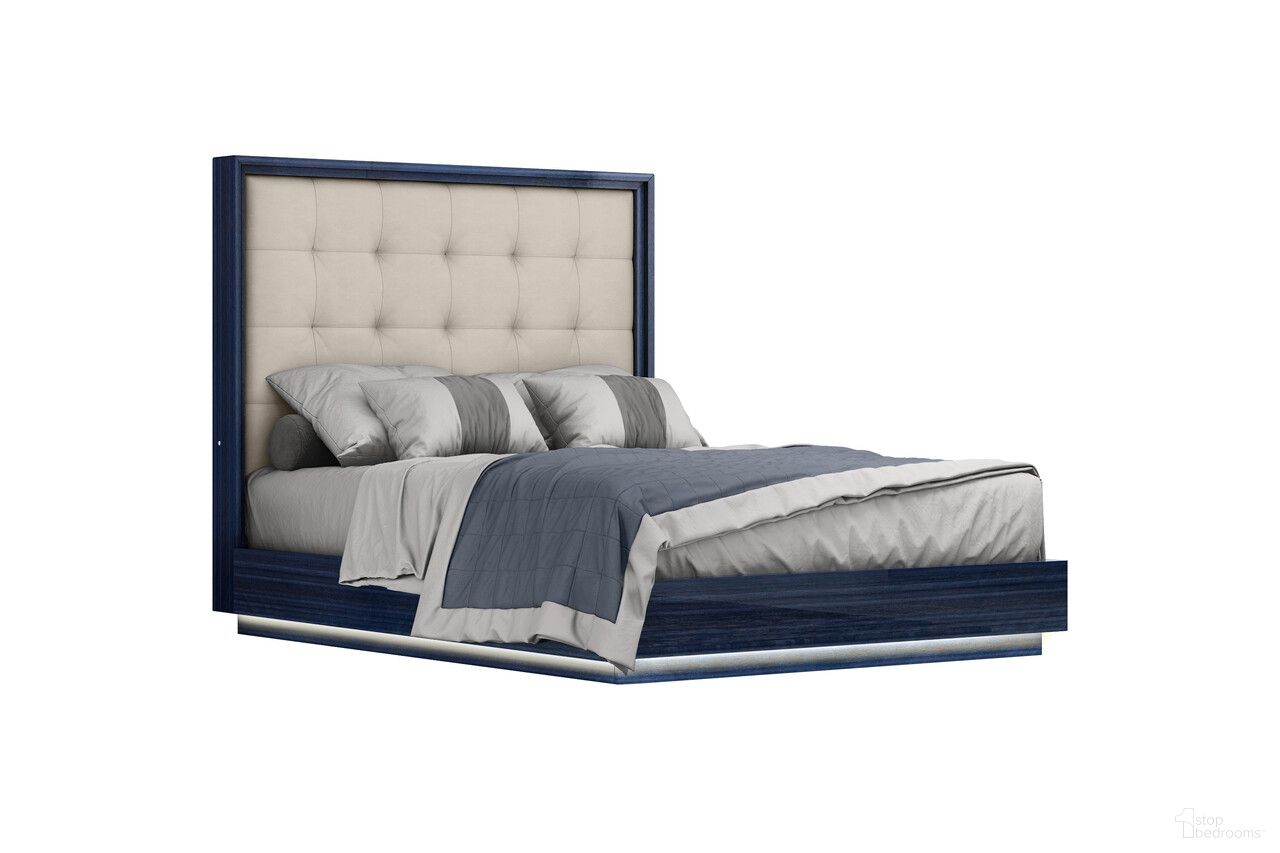 The appearance of Wood and Tufted Faux Leather Lighted Queen Bed Frame In Blue and Gray designed by Homeroots in the modern / contemporary interior design. This blue and gray piece of furniture was selected by 1StopBedrooms from to add a touch of cosiness and style into your home. Sku: 606422. Material: Faux Leather. Bed Size: Queen.