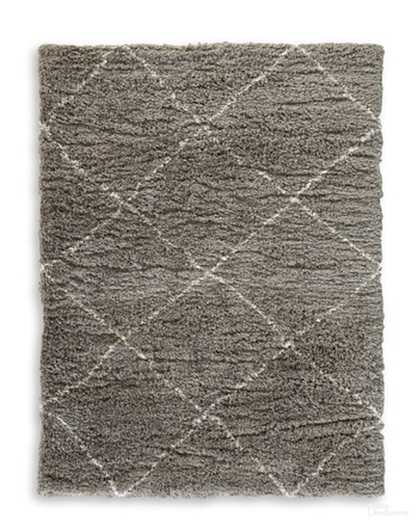 The appearance of Wrenlow 5' x 7' Rug In Gray and Cream designed by Signature Design by Ashley in the transitional interior design. This gray/cream piece of furniture was selected by 1StopBedrooms from Wrenlow Collection to add a touch of cosiness and style into your home. Sku: R407222. Material: Fabric.