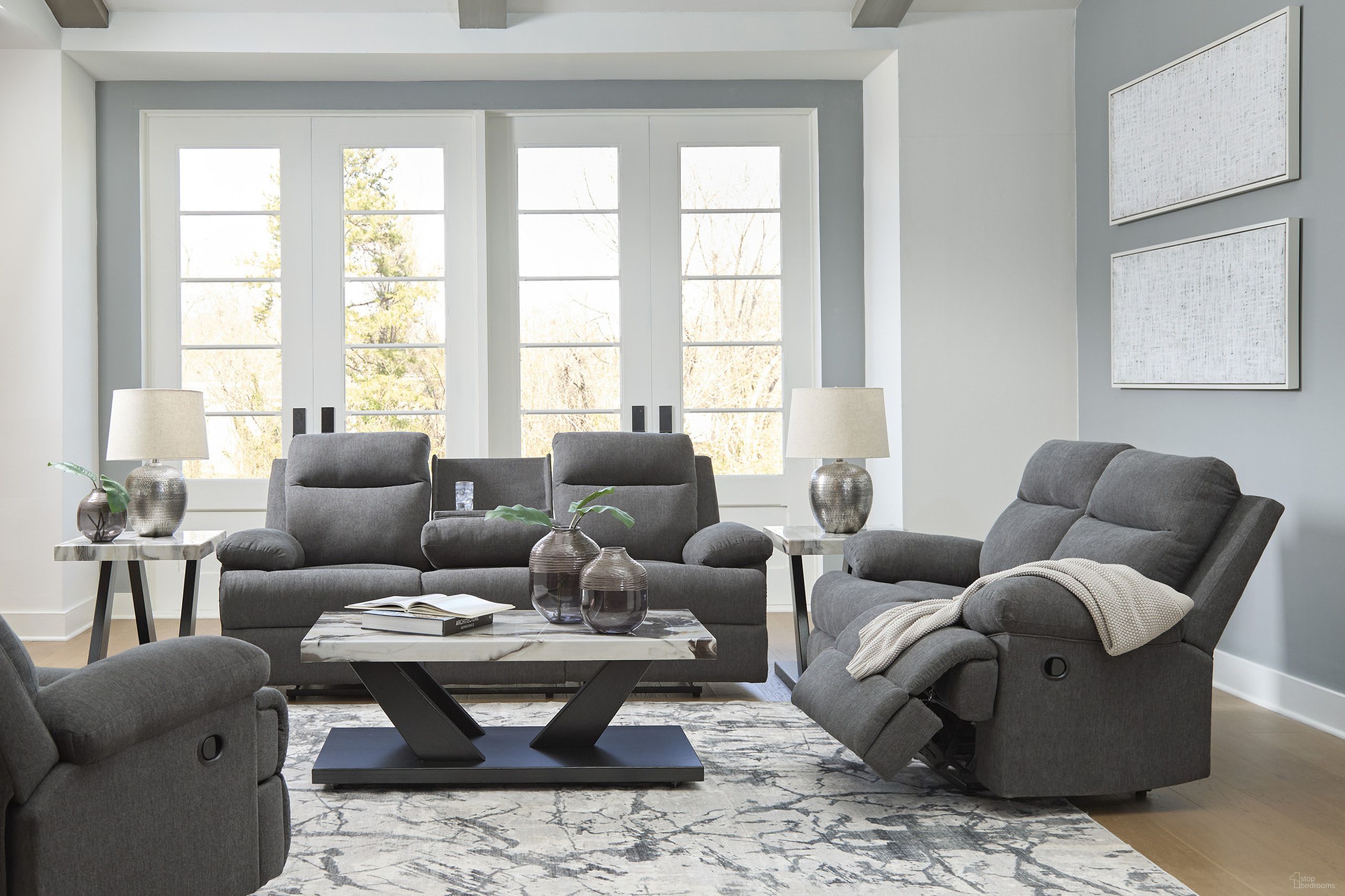 The appearance of Yarrow Lane Reclining Living Room Set In Charcoal designed by Signature Design by Ashley in the modern / contemporary interior design. This charcoal piece of furniture  was selected by 1StopBedrooms from Yarrow Lane Collection to add a touch of cosiness and style into your home. Sku: NC9140689;NC9140686. Material: Fabric.
