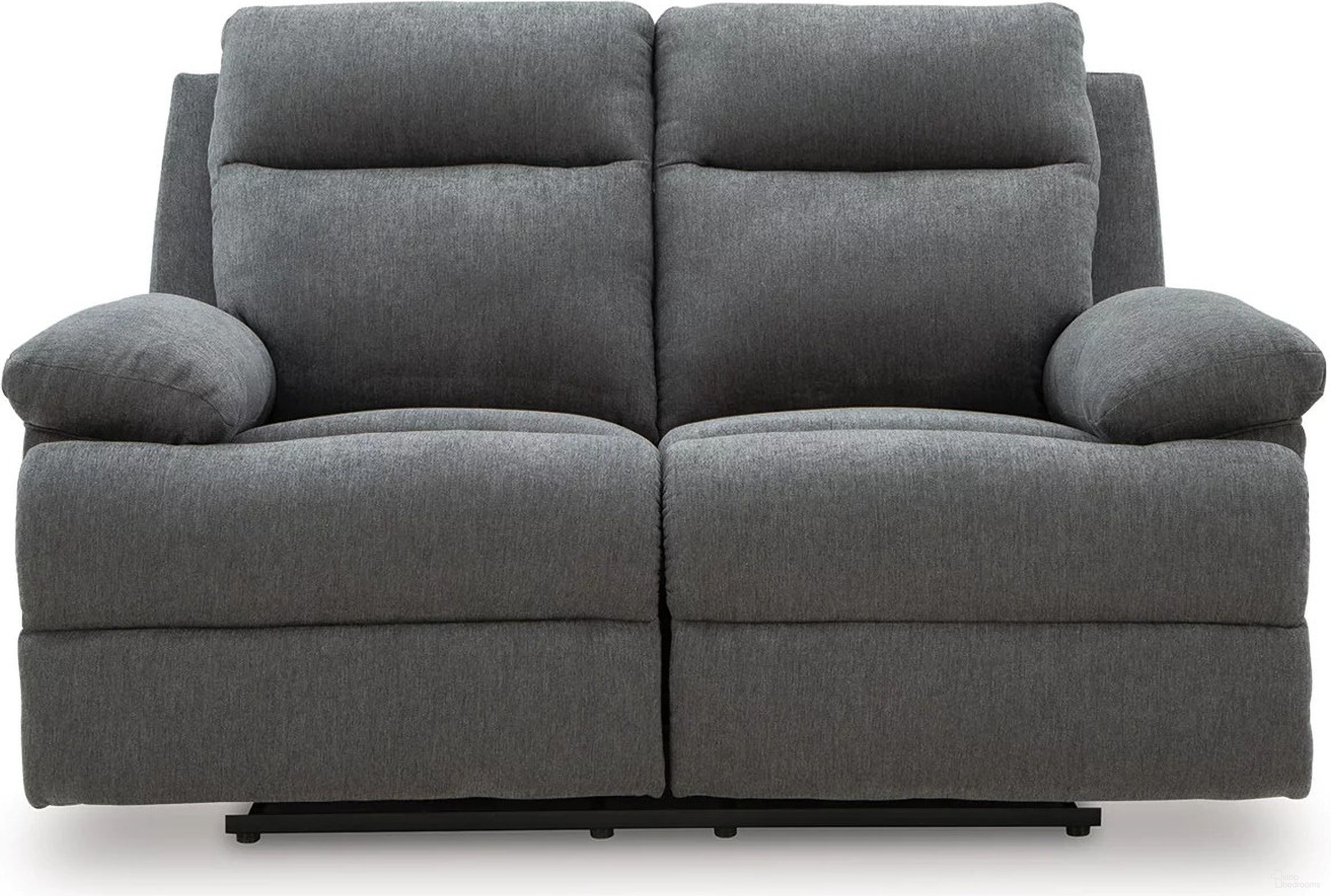 The appearance of Yarrow Lane Reclining Loveseat In Charcoal designed by Signature Design by Ashley in the modern / contemporary interior design. This charcoal piece of furniture  was selected by 1StopBedrooms from Yarrow Lane Collection to add a touch of cosiness and style into your home. Sku: NC9140686. Material: Fabric.