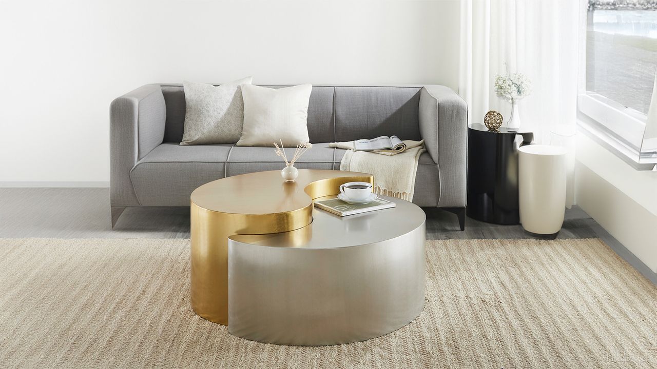 The appearance of Ying Yang Occasional Table Set In Gold and Silver designed by Galaxy Home Furnishings in the modern / contemporary interior design. This gold and silver piece of furniture  was selected by 1StopBedrooms from Ying Yang Collection to add a touch of cosiness and style into your home. Sku: 601955553087;601955553124. Material: Iron.