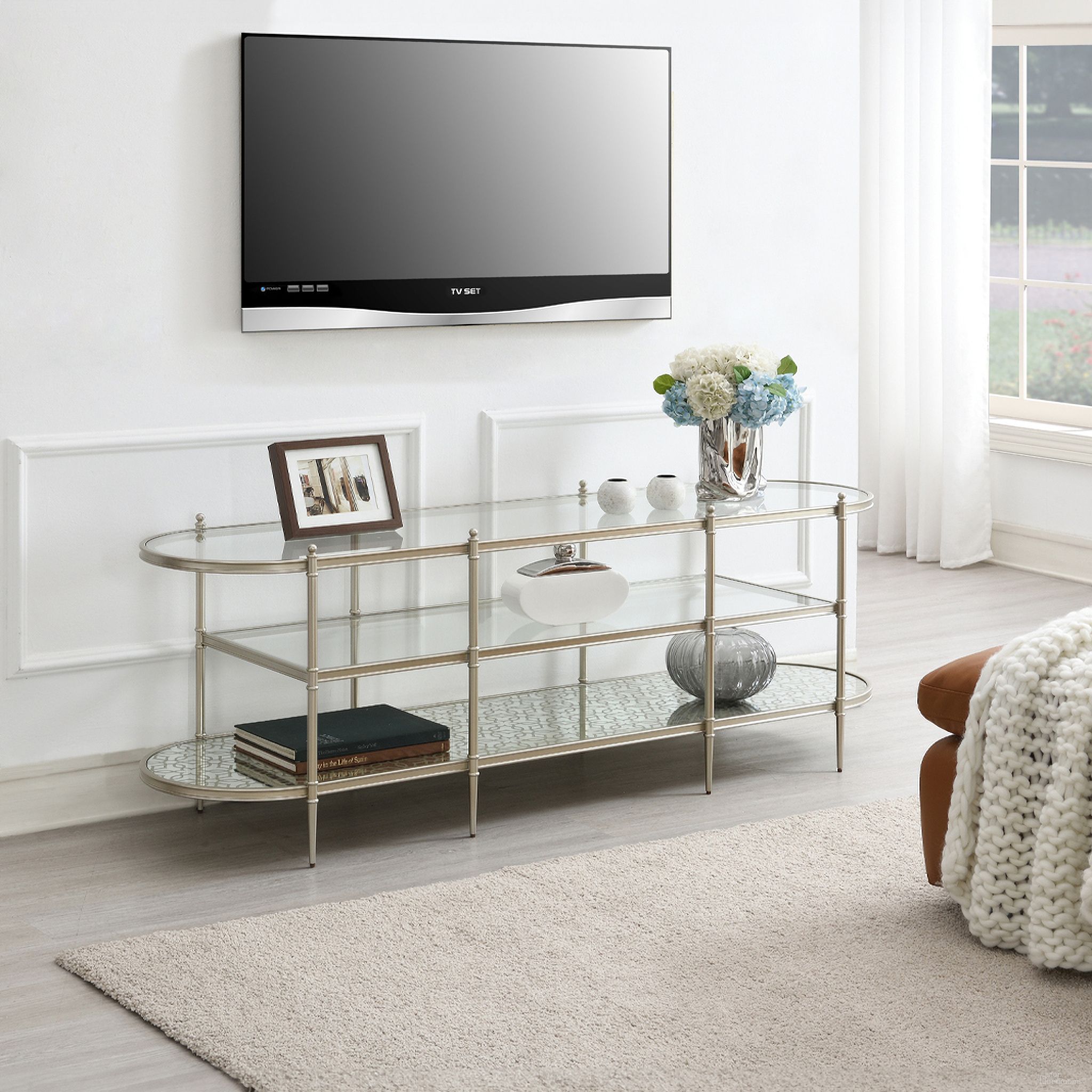 The appearance of Zaba TV Stand In Champagne designed by ACME in the modern / contemporary interior design. This champagne piece of furniture  was selected by 1StopBedrooms from Zaba Collection to add a touch of cosiness and style into your home. Sku: LV02759. Material: Metal.