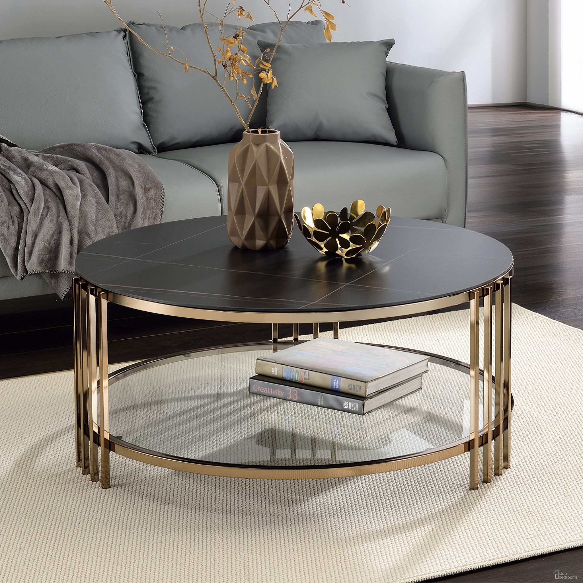 The appearance of Abisha Coffee Table In Champagne designed by ACME in the modern / contemporary interior design. This champagne piece of furniture  was selected by 1StopBedrooms from Abisha Collection to add a touch of cosiness and style into your home. Sku: LV02815. Material: Metal.