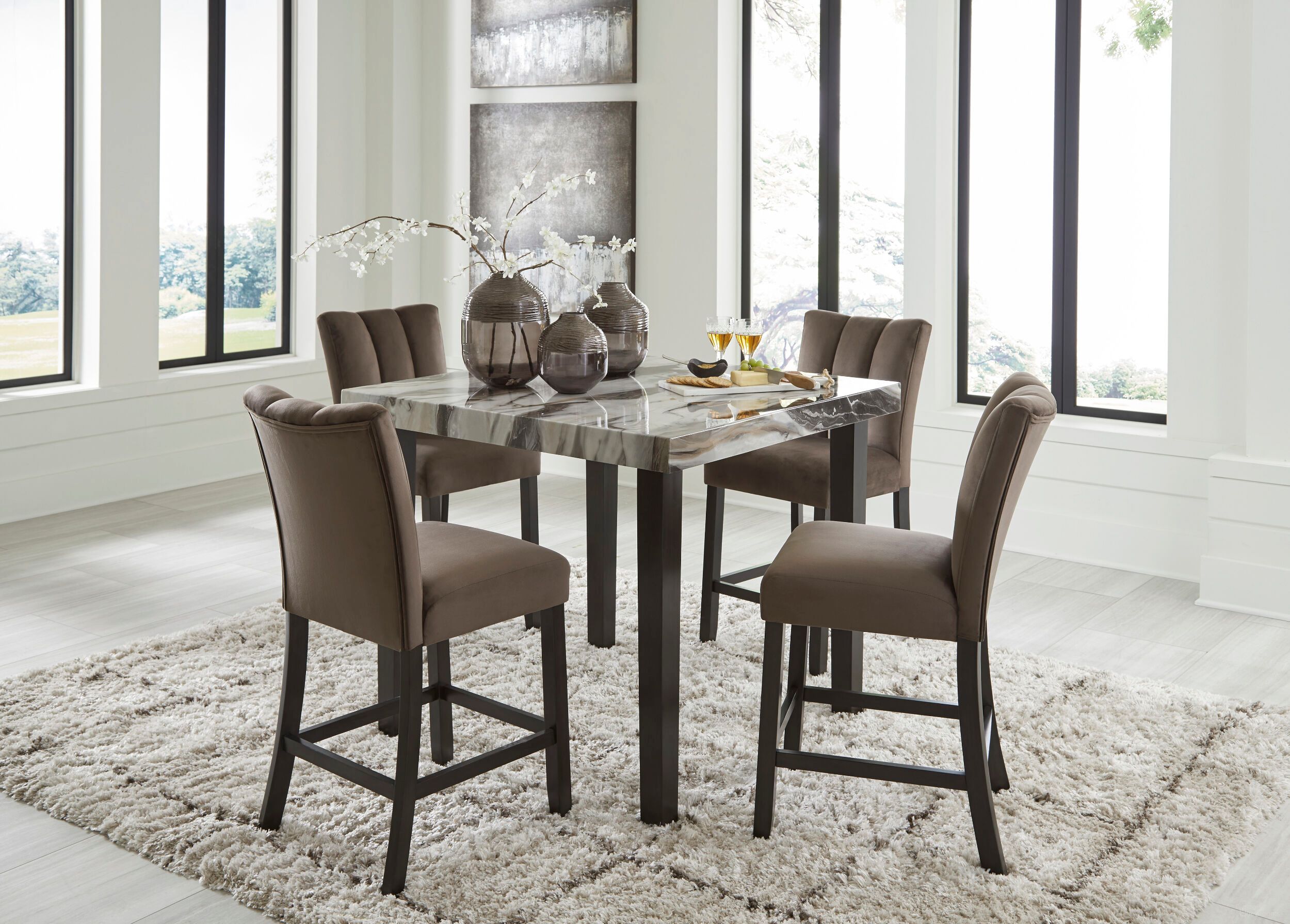 The appearance of Zendalia Counter Height Dining Room Set In Beige and Dark Brown designed by Signature Design by Ashley in the modern / contemporary interior design. This beige and dark brown piece of furniture  was selected by 1StopBedrooms from Zendalia Collection to add a touch of cosiness and style into your home. Sku: NCD581-13;NCD581-124. Table Top Shape: Square. Material: Marble. Size: 42" x 42".
