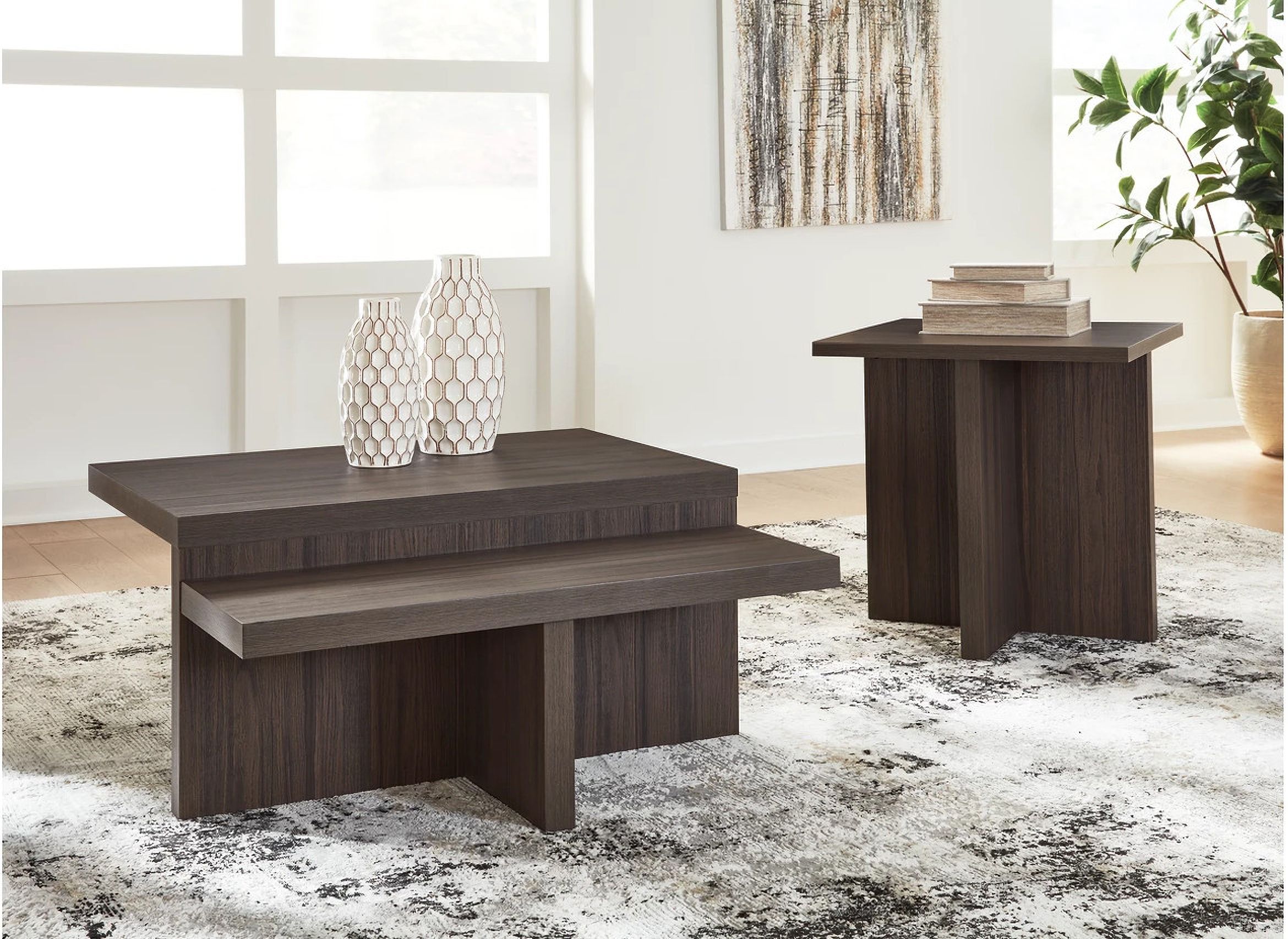 The appearance of Zendex Table Set of 2 In Brown designed by Signature Design by Ashley in the modern / contemporary interior design. This brown piece of furniture was selected by 1StopBedrooms from Zendex Collection to add a touch of cosiness and style into your home. Sku: T304-12. Material: Wood.
