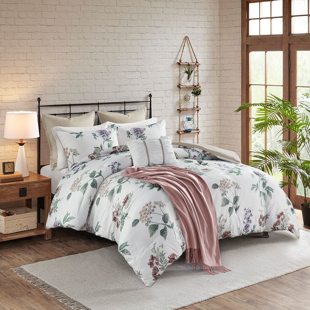The appearance of Zennia 7 Piece Printed Seersucker King/Cal King Comforter Set with Throw Blanket In Taupe and Blush designed by Olliix in the country / farmhouse interior design. This blush/taupe piece of furniture was selected by 1StopBedrooms from Zennia Collection to add a touch of cosiness and style into your home. Sku: MP10-8403. Material: Polyester. Bed Size: King.