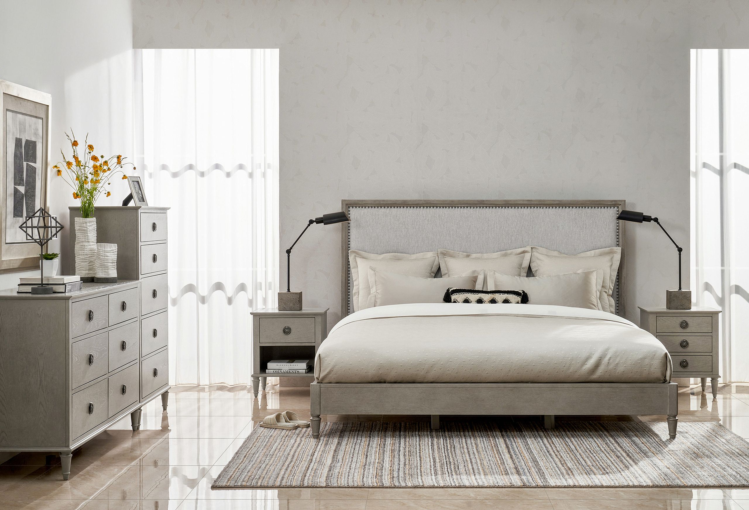The appearance of Zest Upholstered Bedroom Set In Greige designed by Caracole in the modern / contemporary interior design. This greige piece of furniture was selected by 1StopBedrooms from Zest Collection to add a touch of cosiness and style into your home. Sku: MI03-5027-015;MI03-5032-01. Bed Size: Queen. Material: Rubberwood. Bed Type: Upholstered Bed.