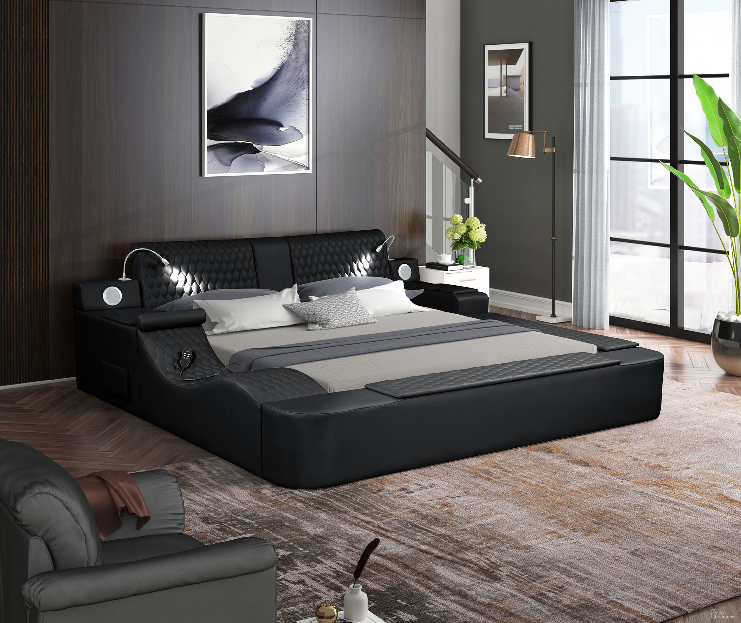 The appearance of Zoya Multifunction King Bed with USB and Remote Controlled Massage In Black designed by Galaxy Home Furnishings in the modern / contemporary interior design. This black piece of furniture was selected by 1StopBedrooms from Zoya Collection to add a touch of cosiness and style into your home. Sku: 698781493298-1;698781493298-2;698781493298-3;698781493298-4. Material: Wood. Bed Size: King. Bed Type: Upholstered Bed.