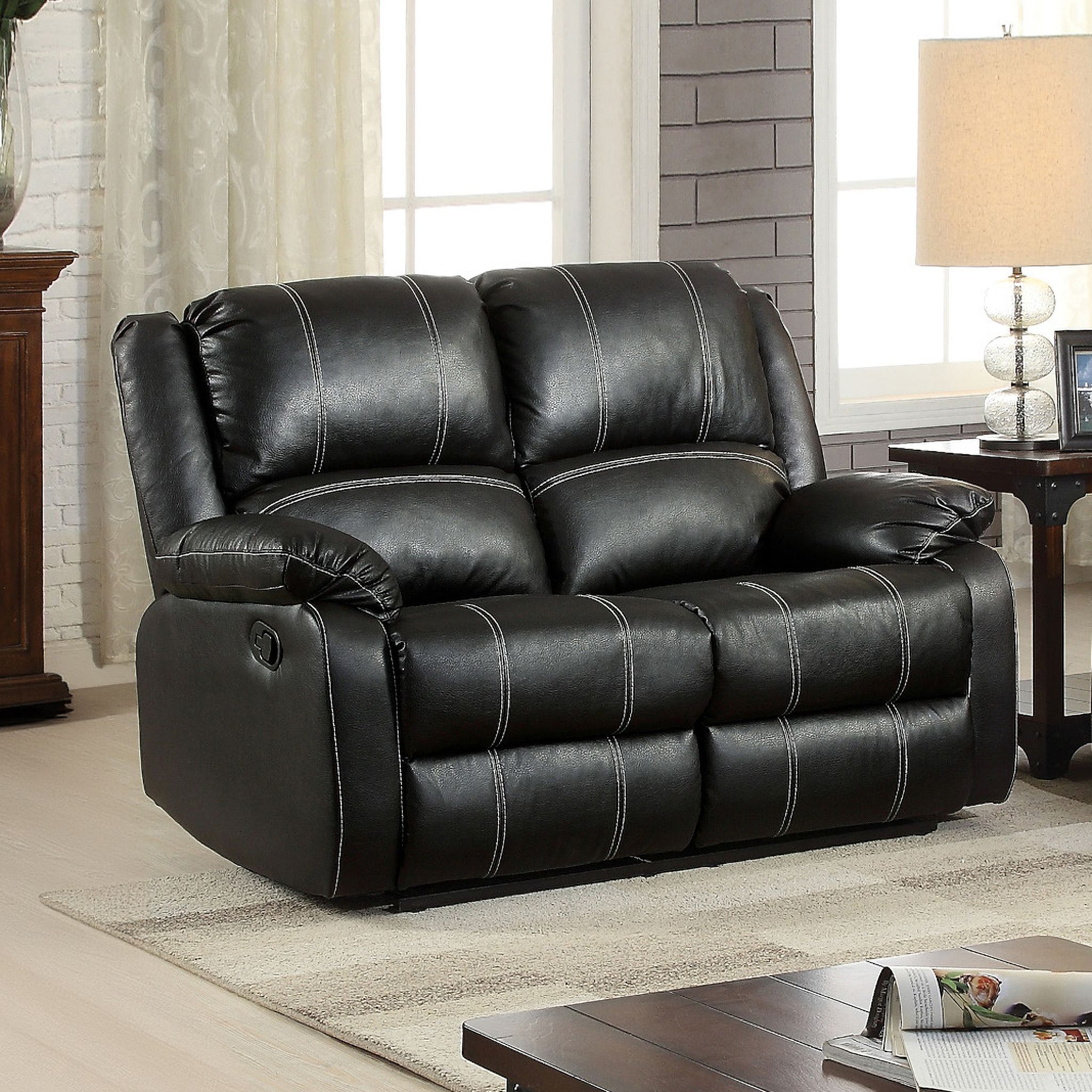 The appearance of Zuriel Motion Loveseat In Black designed by ACME in the modern / contemporary interior design. This black piece of furniture was selected by 1StopBedrooms from Zuriel Collection to add a touch of cosiness and style into your home. Sku: LV52286. Material: PU.