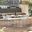 2 LeisureMod Devon White Aluminum Arm Chairs
