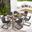Abacus 7-Piece Rectangular Outdoor Patio Aluminum Dining Table Set with Rattan Armchairs In Slate and Walnut