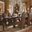 Acme Versailles 9-Piece Pedestal Dining Set in Cherry Oak
