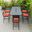 Chelsea Aluminum Outdoor Dining Set with 1 Bar Height Fire Pit Table and 6 Bar Chair In Black with Cherry Cushions