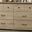 Elara 57 Inch 6-Drawer Dresser with Black Handles In Light Oak