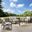 Kaplan 4 Piece Outdoor Loveseat Patio Furniture Set In Oatmeal and Oil Rubbed Bronze