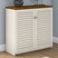 Fairview Small Storage Cabinet with Doors in Antique White and Tea Maple