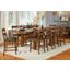 Mariposa 100" Rustic Whiskey Extendable Counter Height Leg Dining Room Set