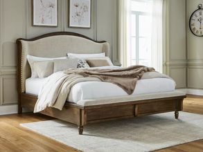 Sturlayne King Upholstered Panel Bed In Brown