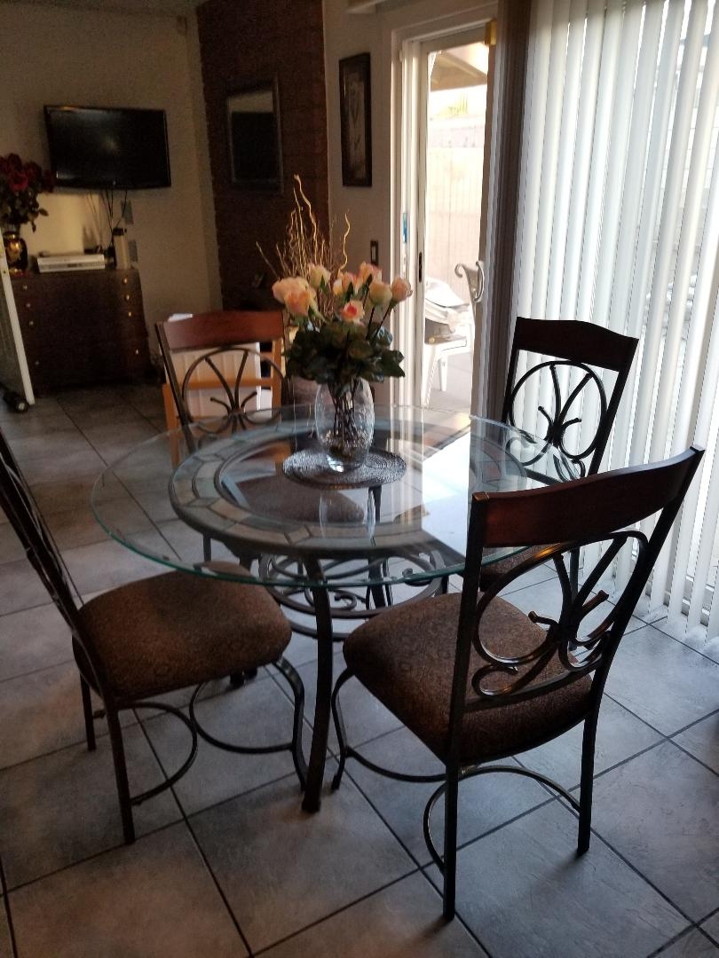 Glambrey Round Dining Room Set by Ashley Furniture 1StopBedrooms